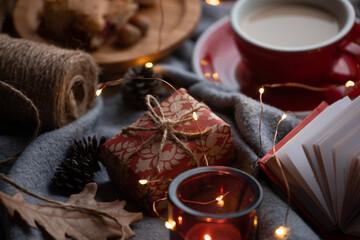  cup of coffee, gift and candles