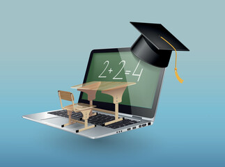School desk with laptop as elearning concept