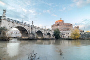 Fototapeta na wymiar Sunset clouds over Castel Sant'Angelo and the Tiber river, Rome, Italy 
