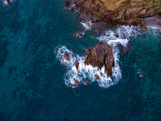 aerial views with 4k drone, centinal direction of rocks and sea.
