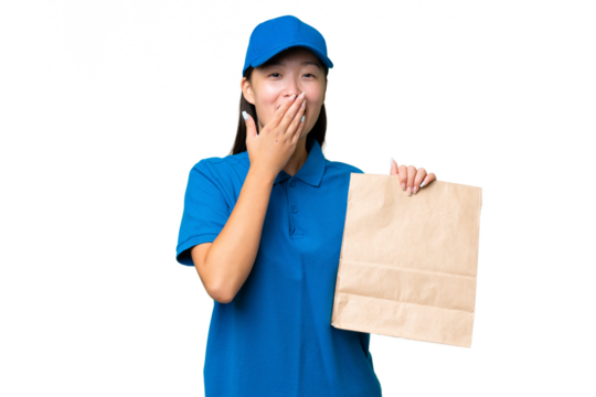 Young Asian woman taking a bag of takeaway food over isolated background happy and smiling covering mouth with hand