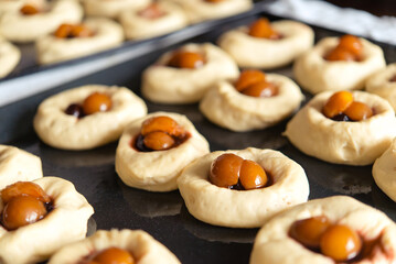 Preparing the dough on a baking sheet. Handmade homemade cakes.	