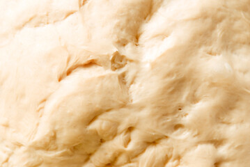 Process of raising the dough. Dough made from natural sourdough. Wheat dough. Fermentation. Top view.	