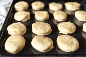 Preparing the dough on a baking sheet. Handmade homemade cakes.	