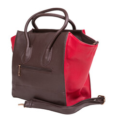 Brown women's bag with red inserts on the sides, with handles and with a belt, on a white background, isolate