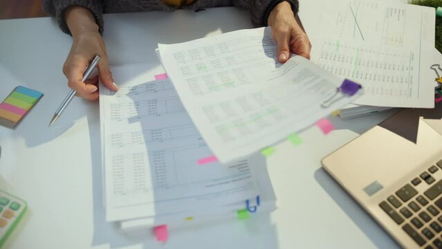 tax time. accountant woman working with documents.