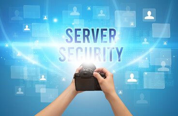 Close-up of hand holding camera