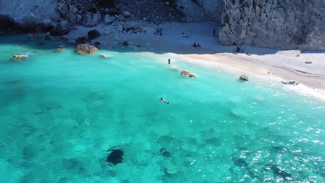 Aerial view of blue lagoon at Greek island: turquoise crystal clear water, beach scene