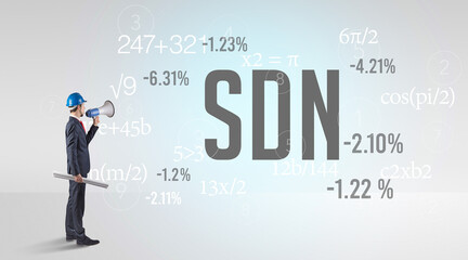 Engineer in hard hat with abbreviation