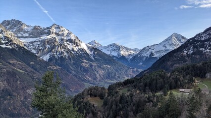 Fototapeta premium Swiss Alps view from Mount Pilatus, Lucerne Switzerland. Mounts with white gray clouds sky