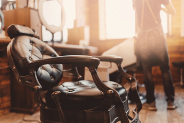 Barbershop armchair vintage color with sunlight. Modern hairdresser and hair salon, barber shop for...