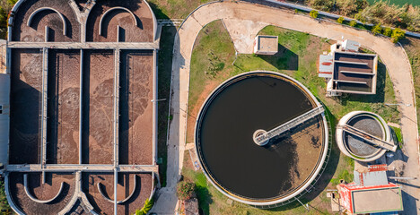 Purification tanks facilities of modern wastewater treatment plant, aerial top view