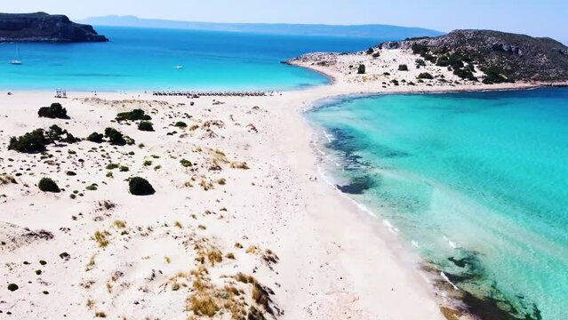 Aerial View of Turquoise Sea divided by sandy beach in Elafonisos, Greece