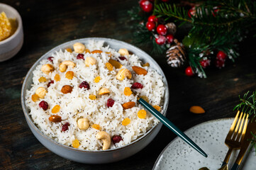 Traditional Christmas kutia. Boiled rice porridge. traditional Slavic holiday ritual dish. Sweet...