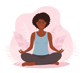 Fototapeta na wymiar An African American woman is sitting in a lotus position, legs crossed in a pose, performing yoga asanas. Vector graphics.