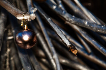 Creative Christmas tree made of sticks,without leaves,with festive balloons