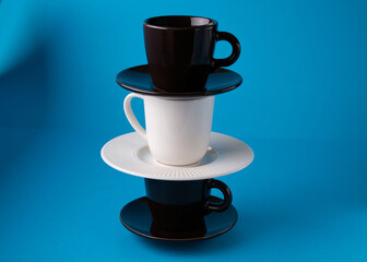 photo of coffee cups on saucer