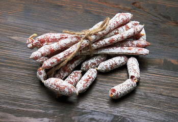 Salami sausages on a wood