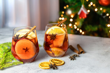 Two glasses of hot winter mulled wine with spices. Christmas hot drink