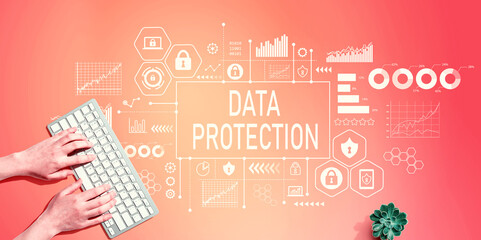 Data protection theme with person using a computer keyboard