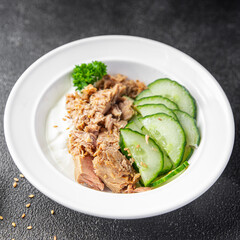 tuna salad, cucumber and yogurt or sour cream fresh delicious snack healthy meal food snack on the table copy space food background rustic top view keto or paleo diet veggie vegan or vegetarian food 