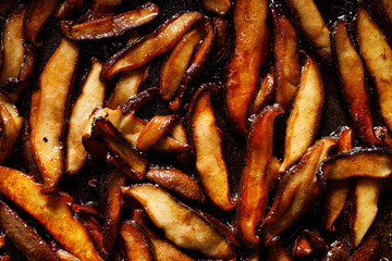 Fried sliced shiitake mushrooms, close up view