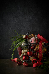 Lot of vintage Christmas decoration in a rustic basket. Copy space - 549563667