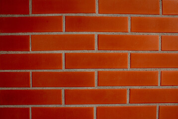 Red brick texture. Construction, ceramic brick wall with granulated cement finish