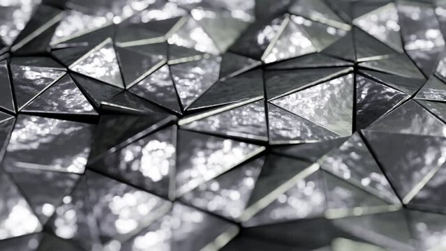 DOF closeup camera abstract looping 3D animation of the moving shiny silver metallic textured steel triangles pattern rendered in UHD as motion background
