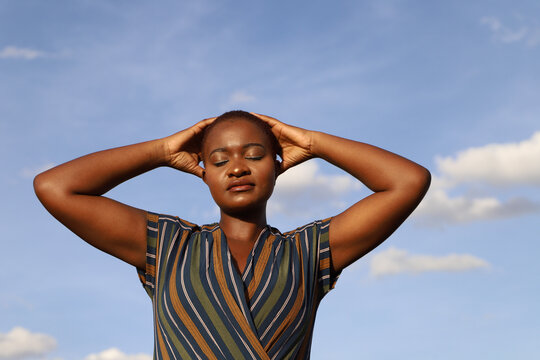 Woman holding her head