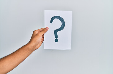Hand of caucasian man holding paper with question mark over isolated white background