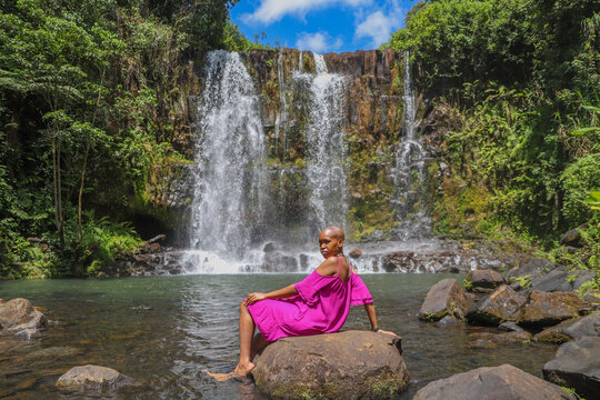 Black woman in the waterfall