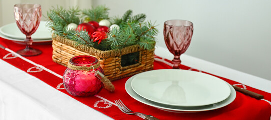 Beautiful table setting served for Christmas dinner in room