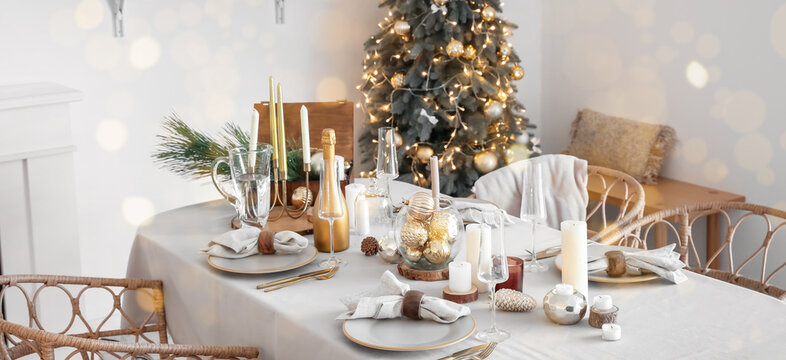 Dining table served for Christmas dinner in room