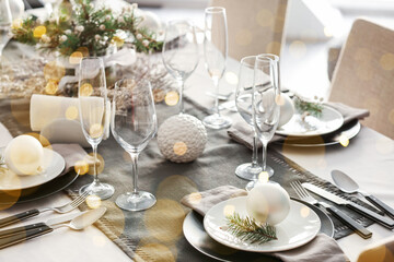 Beautiful table setting for Christmas dinner in room