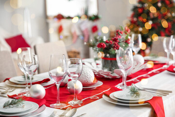 Beautiful table setting for Christmas dinner at home