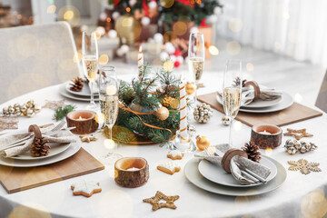 Stylish table setting for Christmas dinner at home