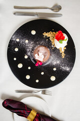 chocolate fondant with berries and flowers