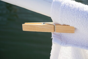clothespin that fixes the laundry to the washing line. Simple system that is functional for drying...