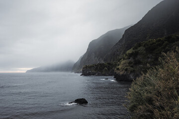 Magnisificat cloudy sunrise atmosphere on Seixal beach photographed in the morning. Seixal beach,...