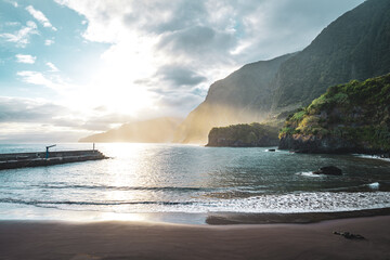 Magnisificat calm sunrise atmosphere on Seixal beach photographed in the morning. Seixal beach,...