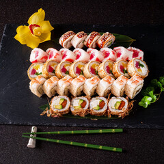 tasty sushi on the black background