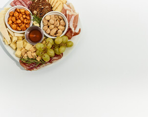 Festive Holiday Charcuterie Appetizer Platter on White Background