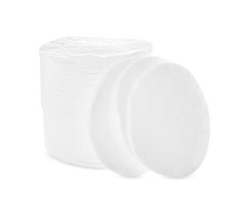 Stack of clean cotton pads on white background