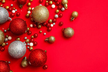 Set of beautiful Christmas balls on red background