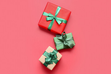 Beautiful Christmas gifts on red background