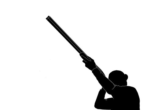 Silhouette of a clay pigeon shooter game hunting with shotgun