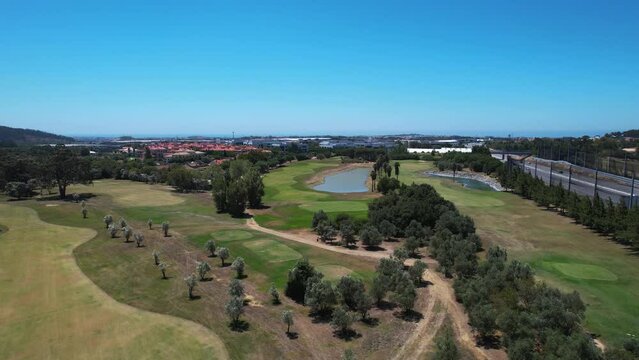 Aerial overview of the Quinta da beloura golf course, in sunny Lisbon, Portugal