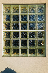 Wavy glass block windows installed on an exterior wall of a building