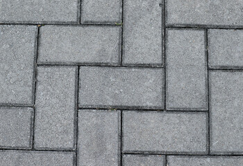 Gray color paving slabs in the city, pedestrian street